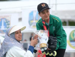 Gemilang di Tengah Tantangan: Kartika Winna Shafira Sabet Emas di PON XXI Aceh-Sumut 2024!